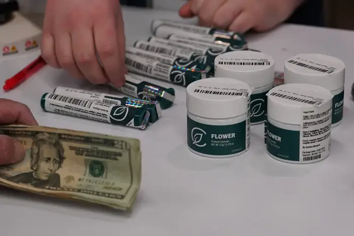 A customer purchases marijuana for recreational use at the Curaleaf dispensary in Bellmawr, New Jersey, April 21st, 2022